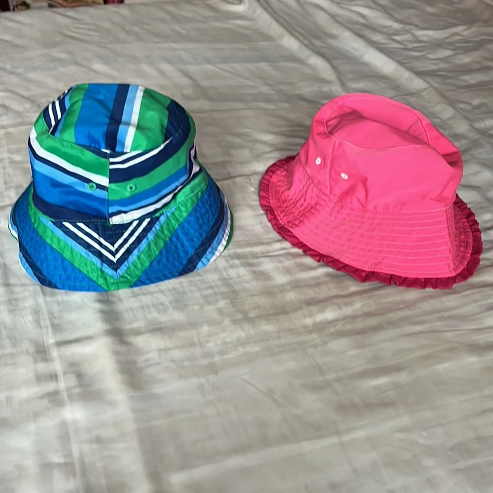 UV Skinz kids fuchsia and blue bucket hats in size 6 and 7